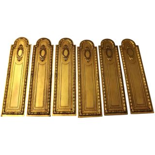 A set of Six 19th Century French Empire Style Gilt Push Plates